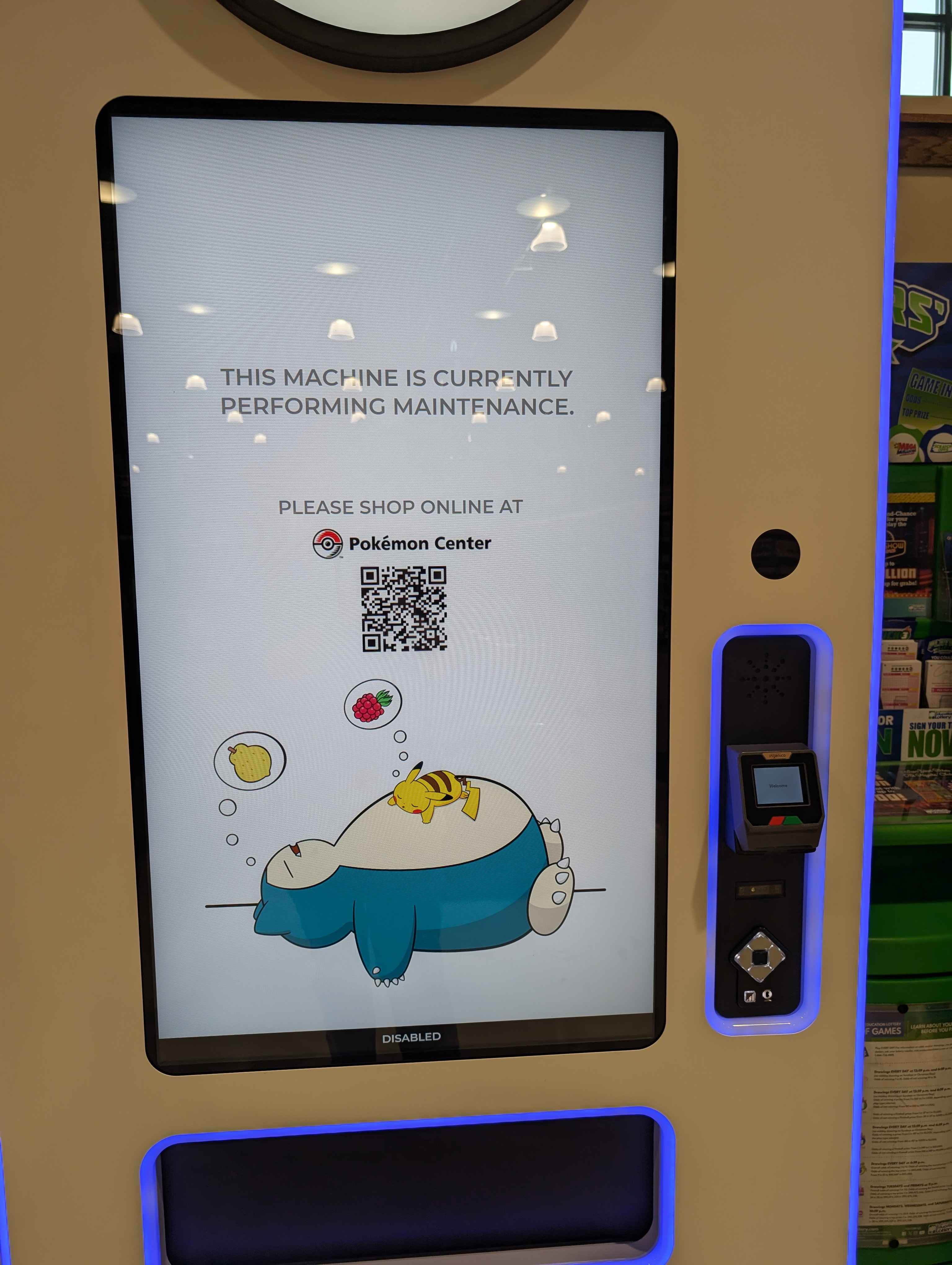Official Pokémon vending machine displaying a maintenance message while disabled